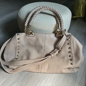 Large handbag satchel style with removal shoulder strap.